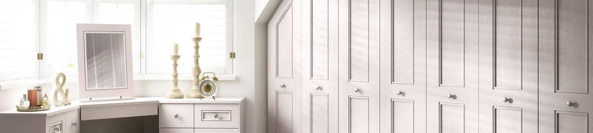 White fitted wardrobe and bedroom storage