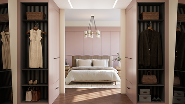 pink modern bedroom with double bed and pink walk in wardrobe